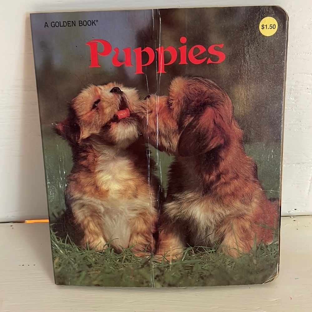 Vintage 1982 A Golden Book Puppies hand over board book
